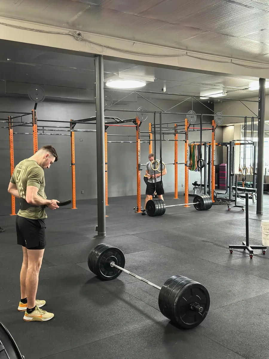 Athletes training with barbells at Gardner Training