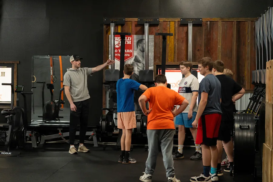 Landon Gardner instructing athlete group training